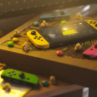 Nintendo switch console resting on top of a pizza box