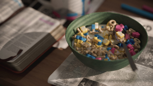 Bowl of cereal on newspaper