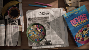 Bowl of Lucky Charms cereal sits atop a magazine. It's surrounded by a Bible, box of cereal, coffee, highlighter pens, and a banana
